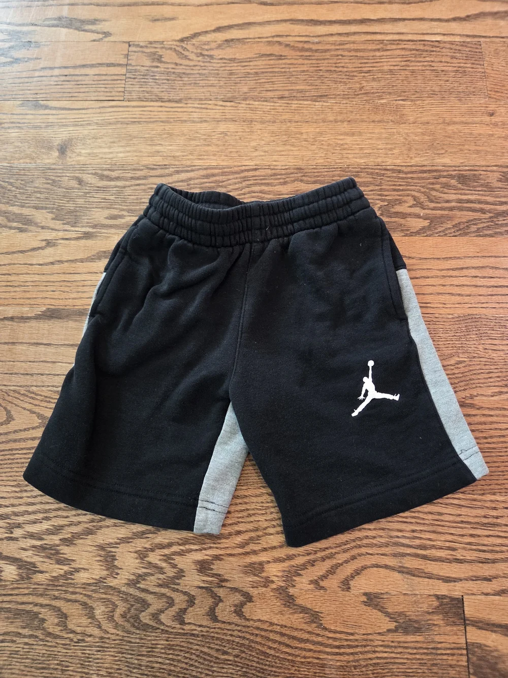Jordan-  Black Shorts with Gray Side Panels and White Jumpman- Size 4-5 Years